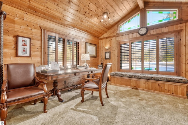 dining space featuring a wealth of natural light, carpet flooring, beamed ceiling, and wood ceiling