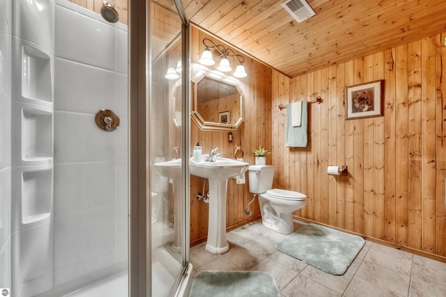 bathroom featuring wooden walls, wooden ceiling, walk in shower, and toilet