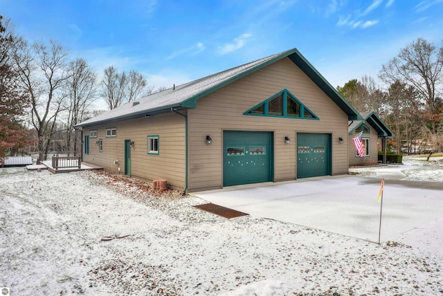 view of property exterior with a garage