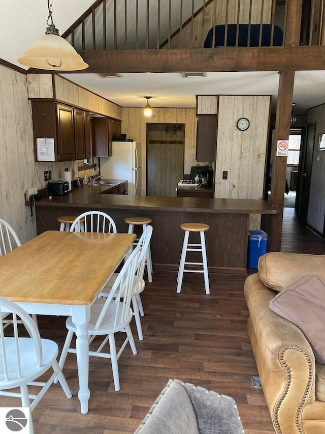 interior space featuring dark hardwood / wood-style flooring and sink