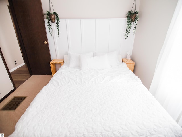 bedroom featuring hardwood / wood-style flooring