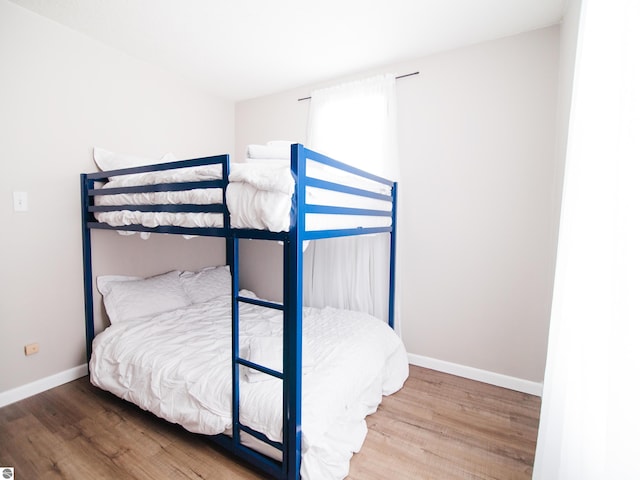 bedroom featuring hardwood / wood-style flooring