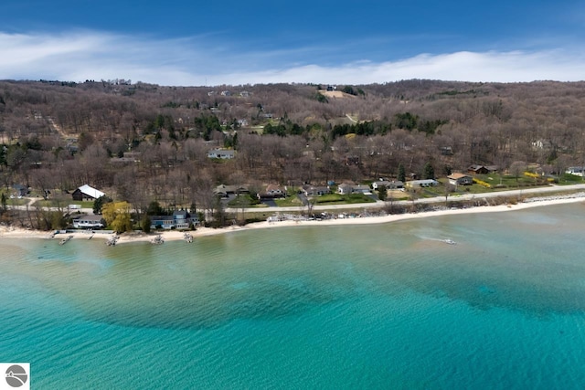 aerial view featuring a water view and a view of the beach