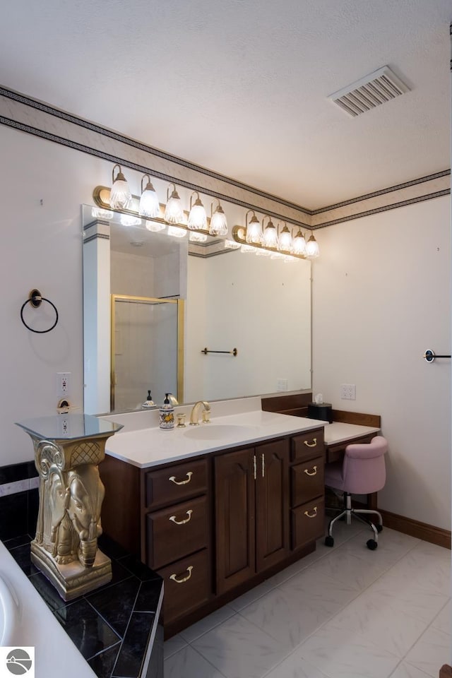 bathroom featuring vanity with extensive cabinet space, tile flooring, and separate shower and tub