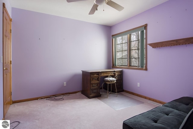 unfurnished office with light carpet and ceiling fan