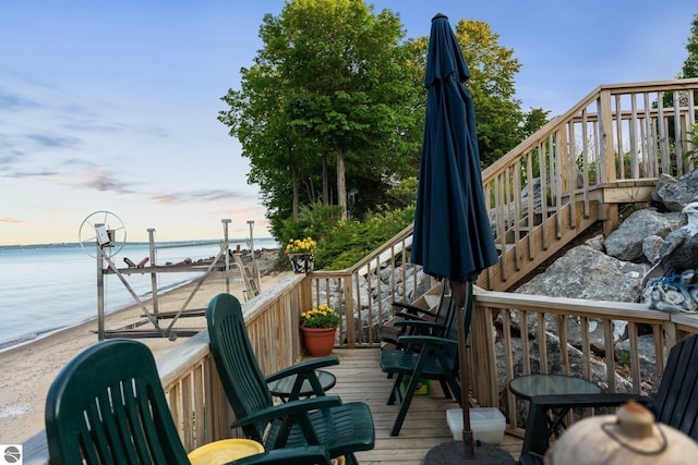 deck at dusk with a water view