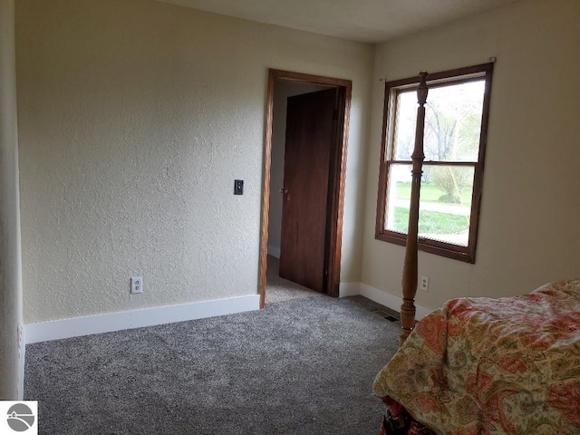 unfurnished bedroom featuring carpet flooring