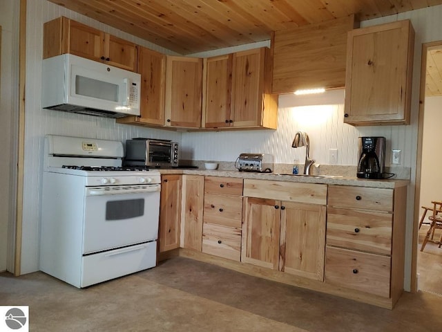 kitchen featuring wood ceiling, light brown cabinetry, white appliances, and sink