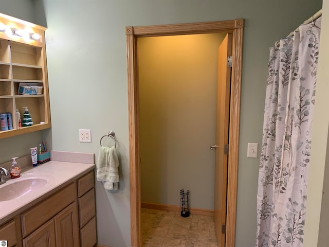 bathroom featuring oversized vanity and tile floors