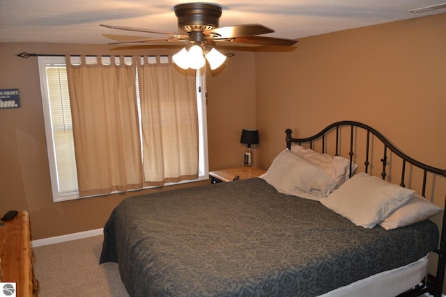 bedroom featuring ceiling fan and carpet flooring