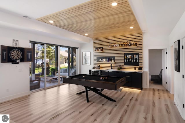 rec room with wood ceiling, light wood-type flooring, bar, and billiards