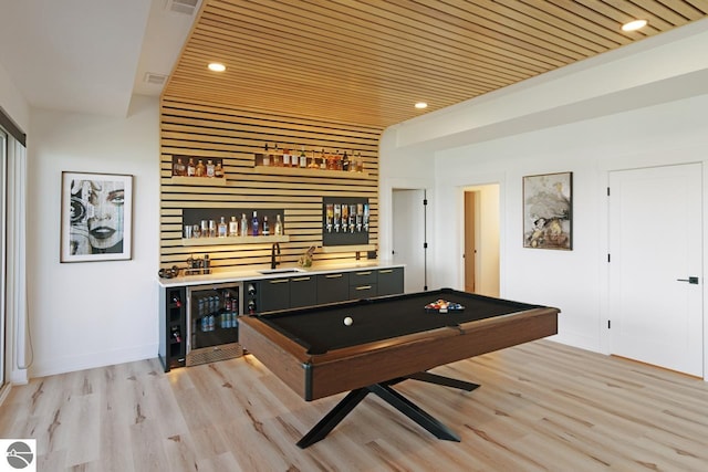 playroom featuring bar, pool table, wine cooler, wood ceiling, and light wood-type flooring