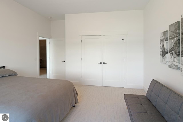 carpeted bedroom featuring a closet