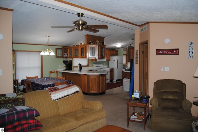 carpeted living room featuring ornamental molding, lofted ceiling, ceiling fan with notable chandelier, and a textured ceiling