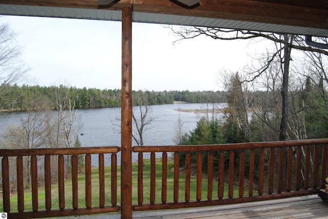 deck featuring a water view