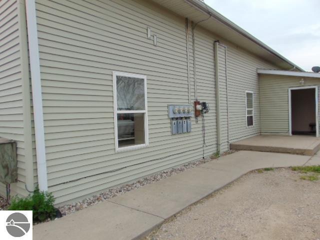 view of property exterior featuring a patio