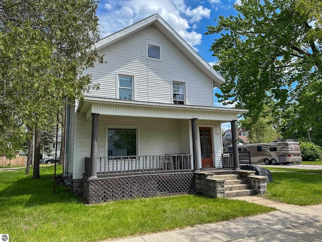 view of front of house featuring a porch and a front yard