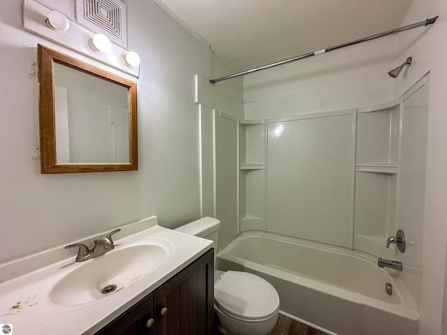 full bathroom featuring bathing tub / shower combination, toilet, and vanity