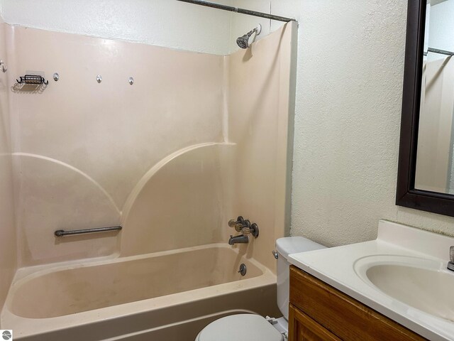 spare room with a baseboard heating unit and hardwood / wood-style flooring