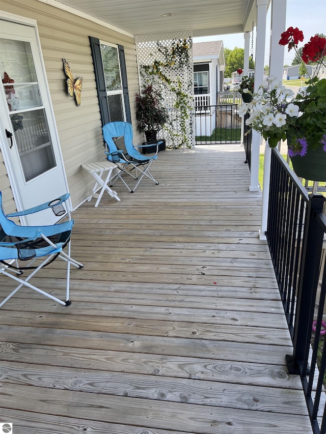 deck featuring covered porch