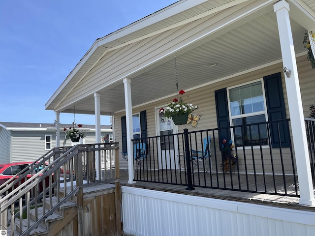 wooden deck with a porch