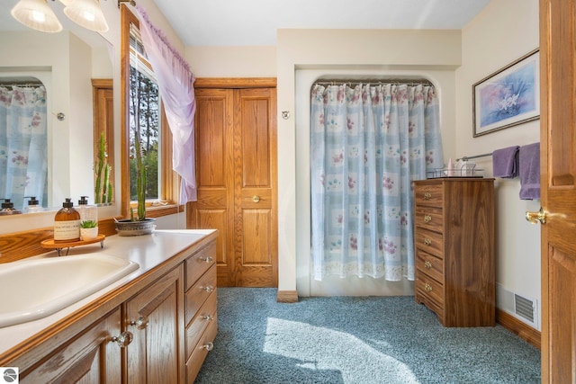 bathroom featuring large vanity