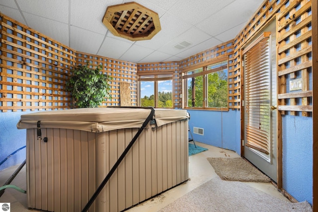 miscellaneous room featuring a drop ceiling