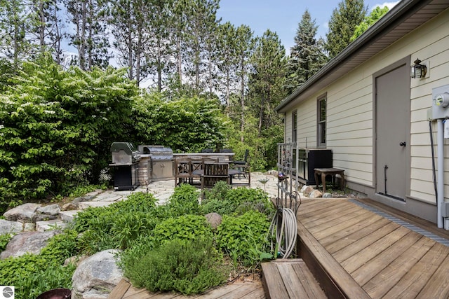 wooden deck featuring a patio