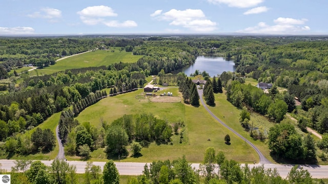 aerial view featuring a rural view and a water view