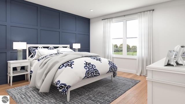 bedroom featuring light hardwood / wood-style flooring