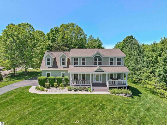 view of front of property with a front lawn and a porch