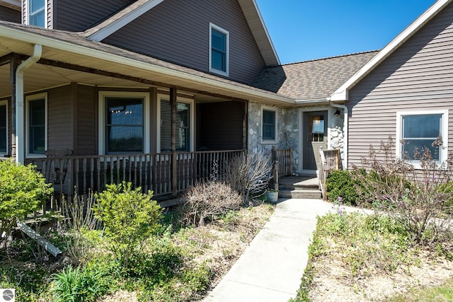 property entrance with covered porch