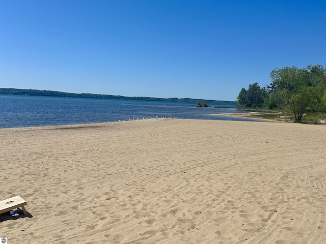 view of water feature with a beach view