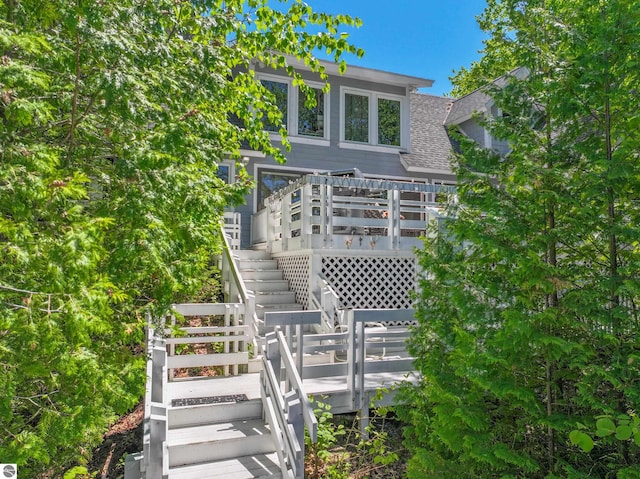 view of front of home with a wooden deck