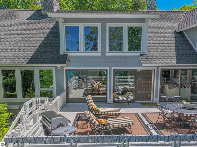 rear view of property featuring a patio