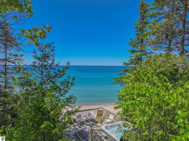 view of water feature with a beach view