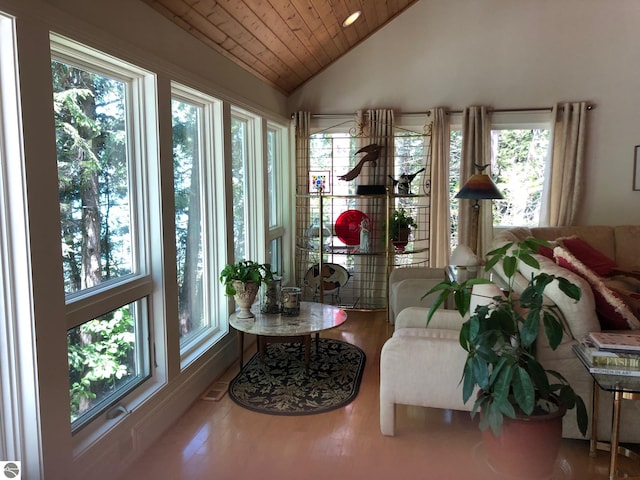 sunroom with vaulted ceiling, plenty of natural light, and wooden ceiling