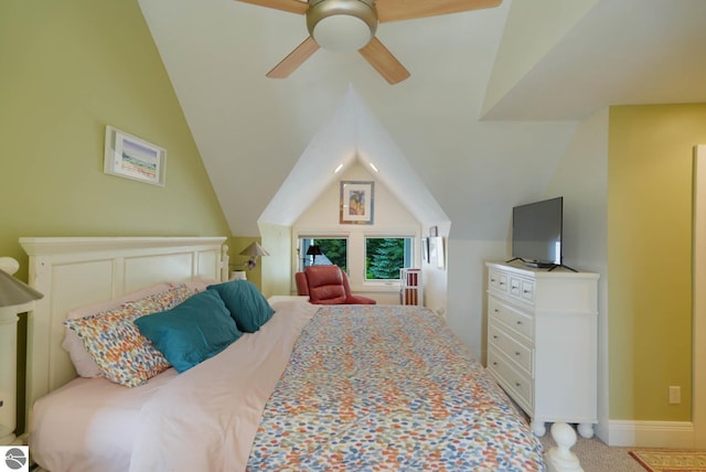 carpeted bedroom featuring ceiling fan and lofted ceiling