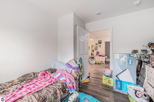 bedroom featuring dark hardwood / wood-style floors