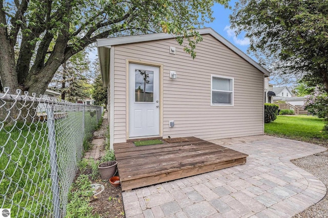 view of outdoor structure with a lawn