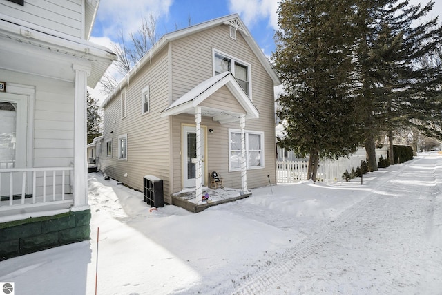 view of front of property with cooling unit