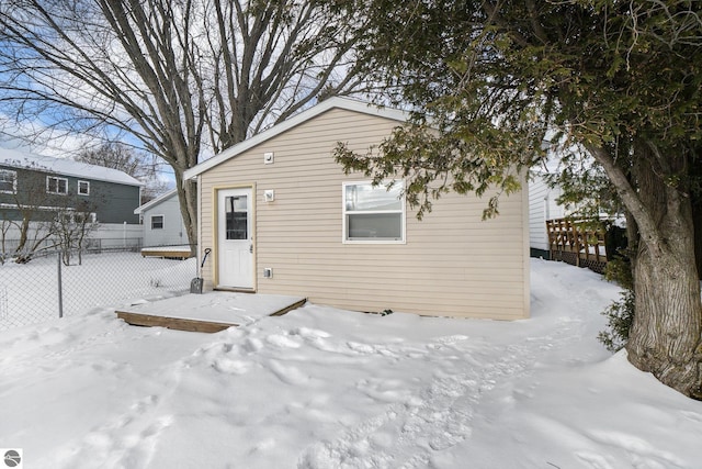 view of snow covered house