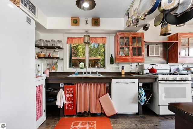 kitchen with sink and white appliances