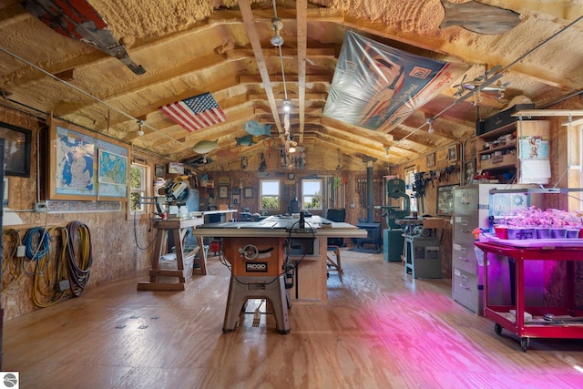 dining room featuring lofted ceiling