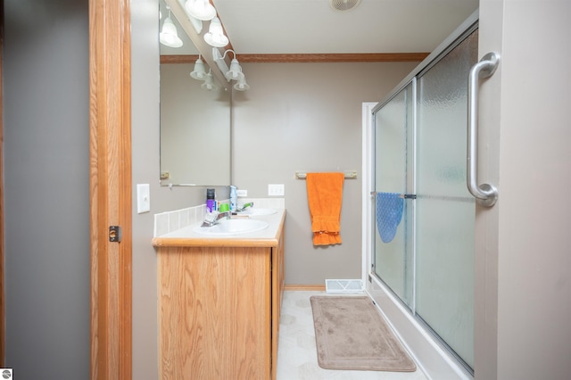 bathroom featuring vanity and walk in shower