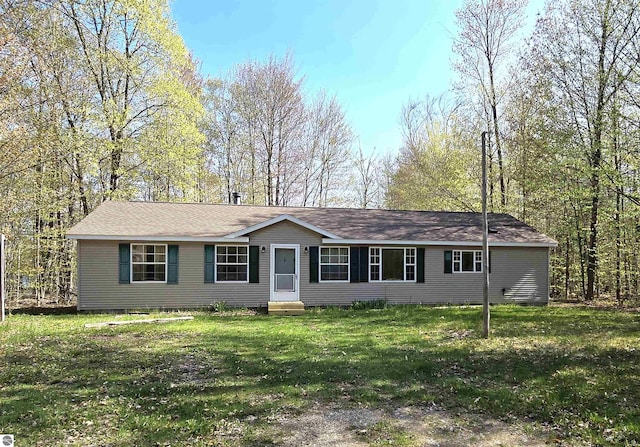 ranch-style house with a front yard