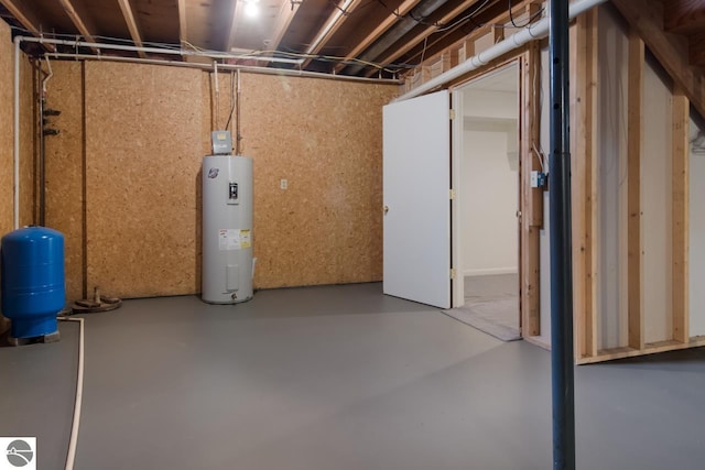 basement featuring electric water heater