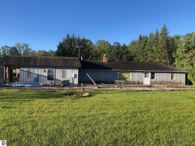 4472 Crescent Beach Rd, Onekama, MI 49675 - view of front of home featuring a front yard