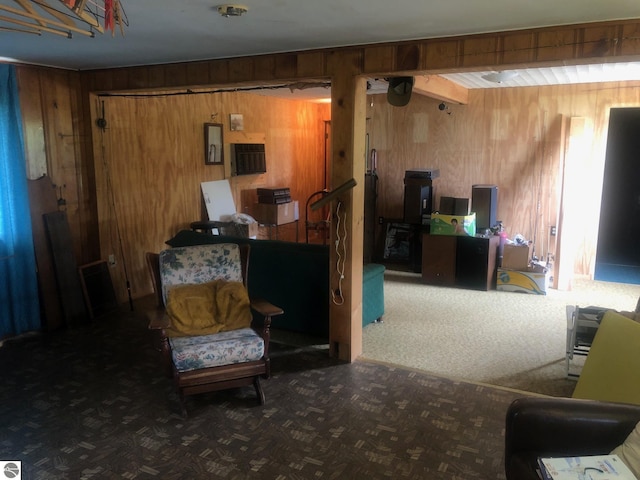 4472 Crescent Beach Rd, Onekama, MI 49675 - interior space featuring carpet flooring, electric panel, and wooden walls