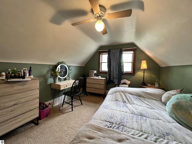 bedroom with carpet flooring, ceiling fan, and lofted ceiling